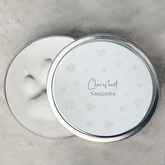 Clay pawprint impression in a round tin, pet pawprint keepsake — Springfield Pet Cremation